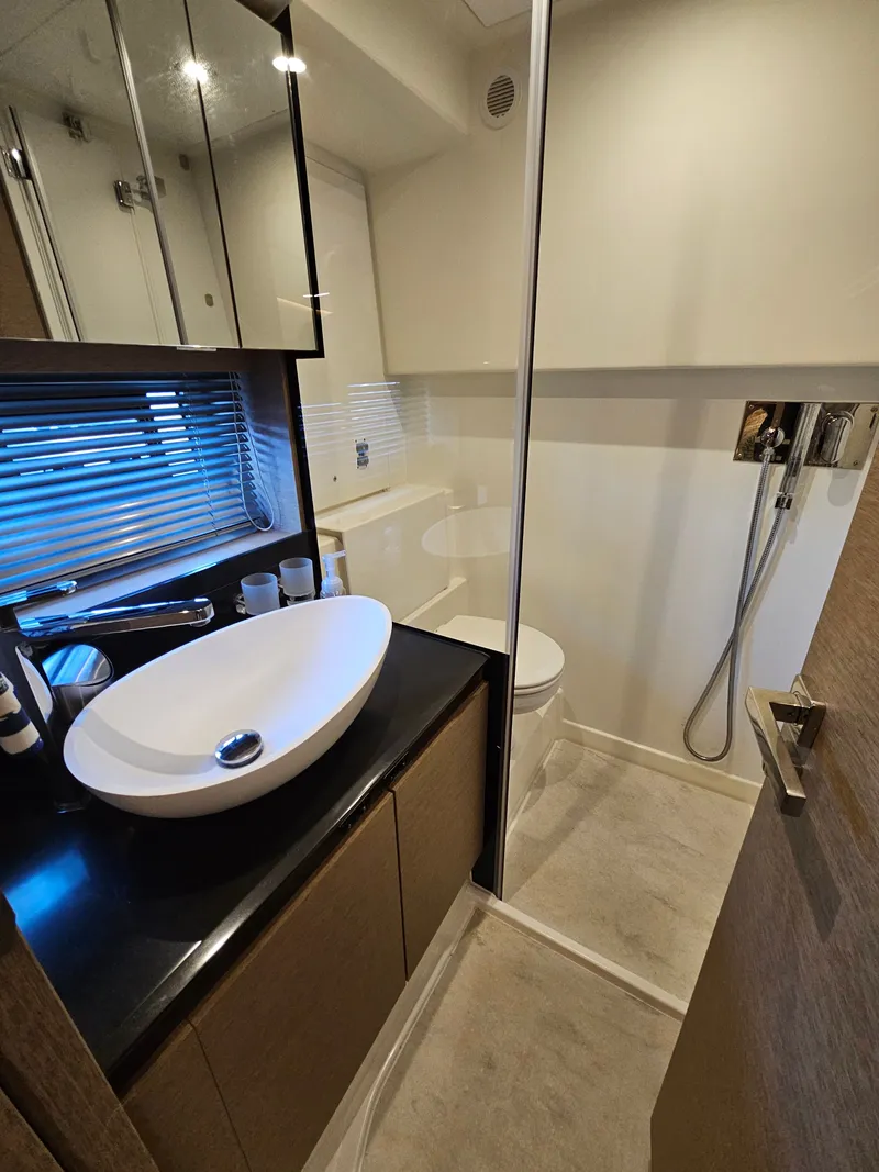 Slide: The Image of Luxurious bathroom on a 2018 Prestige 460 yacht. - 24