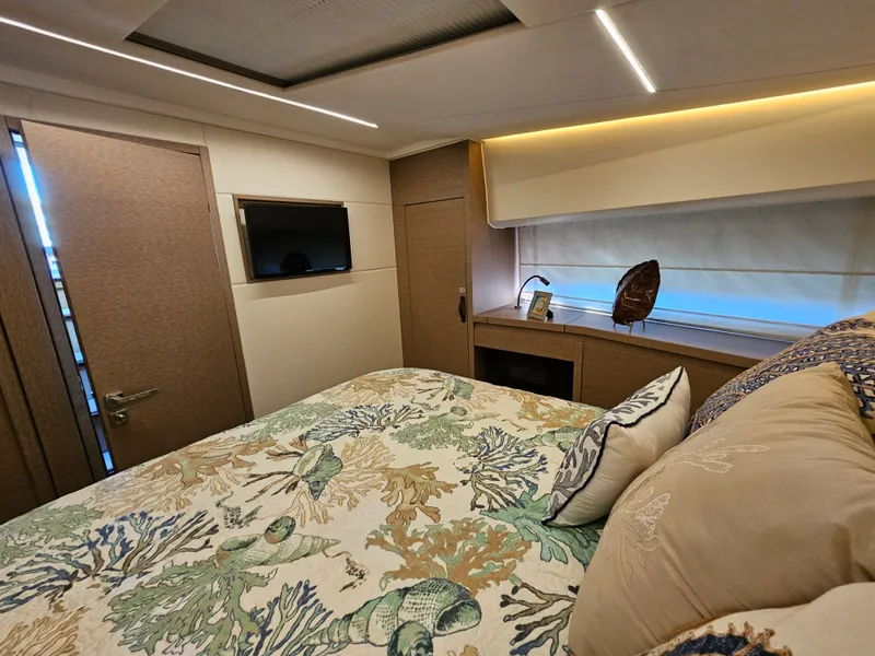 Slide: The Image of Luxurious bedroom on a 2018 Prestige 460 yacht. - 25
