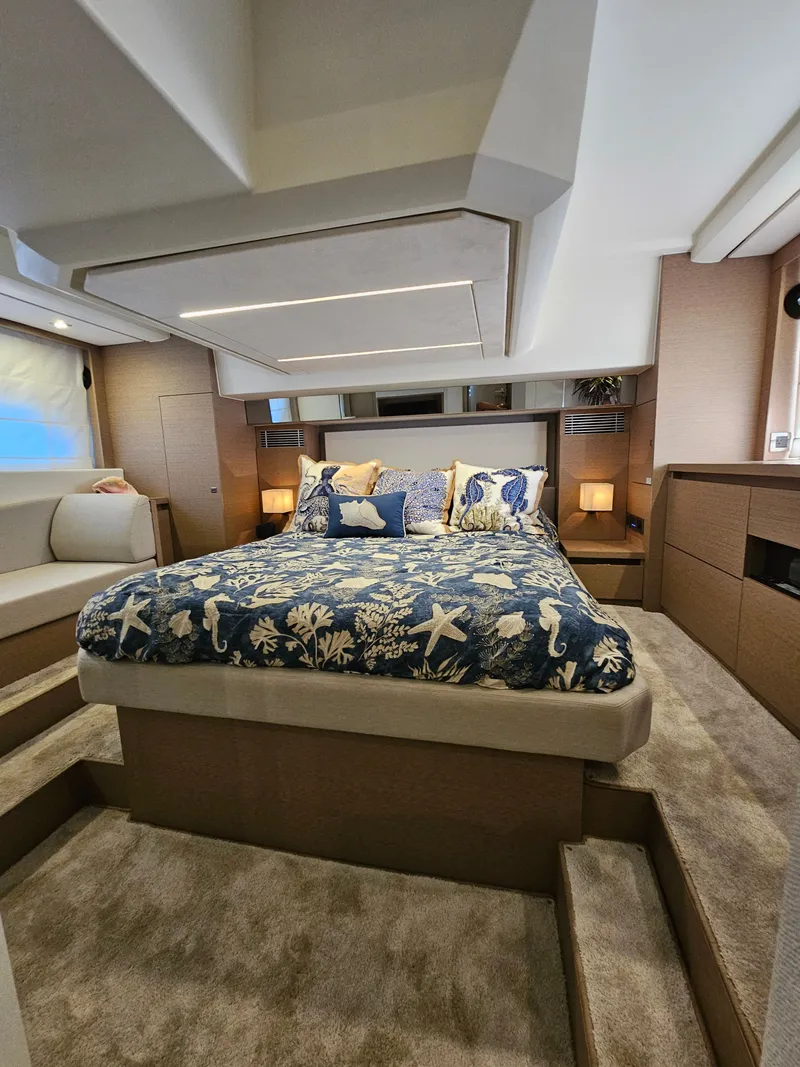 Slide: The Image of Luxurious bedroom on a 2018 Prestige 460 yacht. - 27