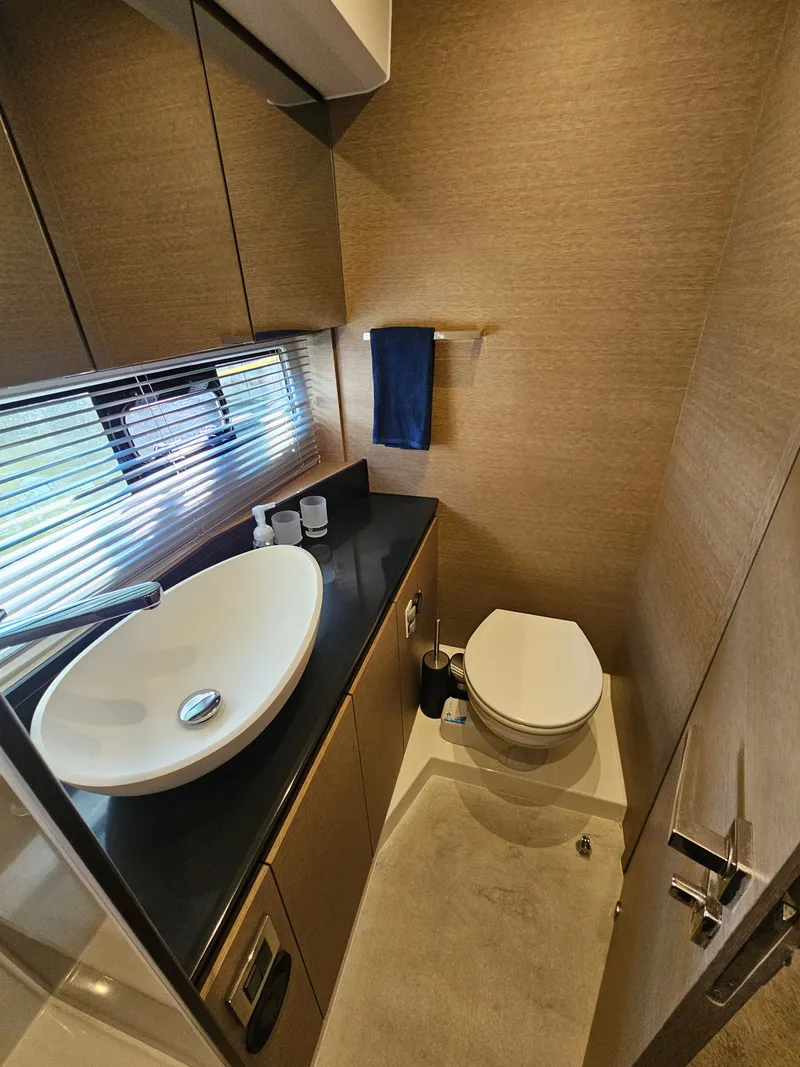 Slide: The Image of Luxurious bathroom on a 2018 Prestige 460 yacht. - 29