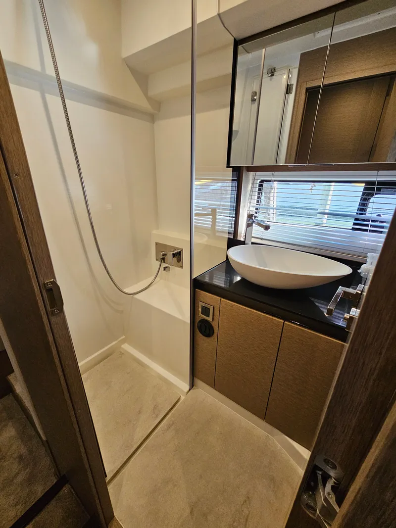 Slide: The Image of Luxurious bathroom in a 2018 Prestige 460 yacht. - 30