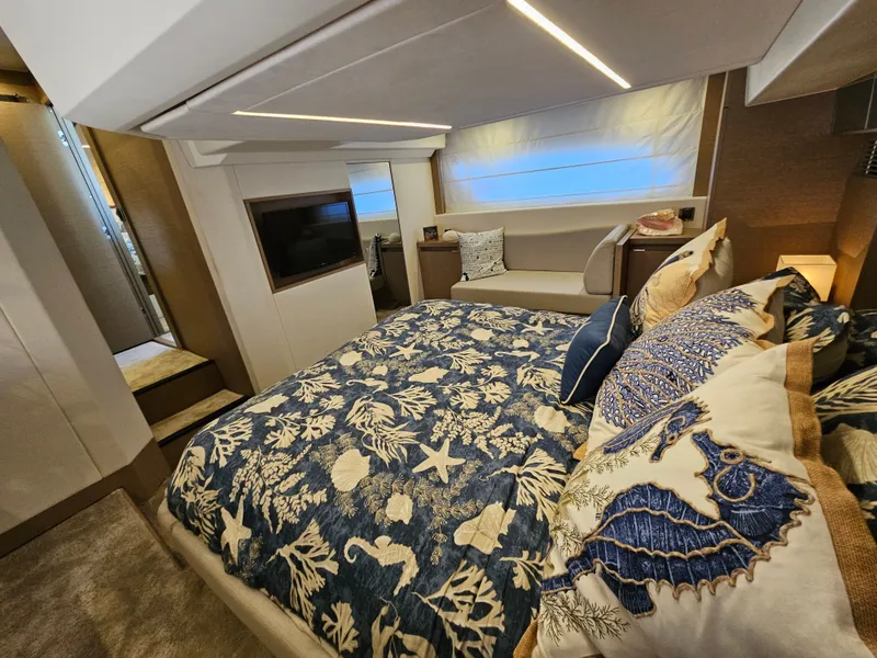 Slide: The Image of Luxurious bedroom on a 2018 Prestige 460 yacht. - 31