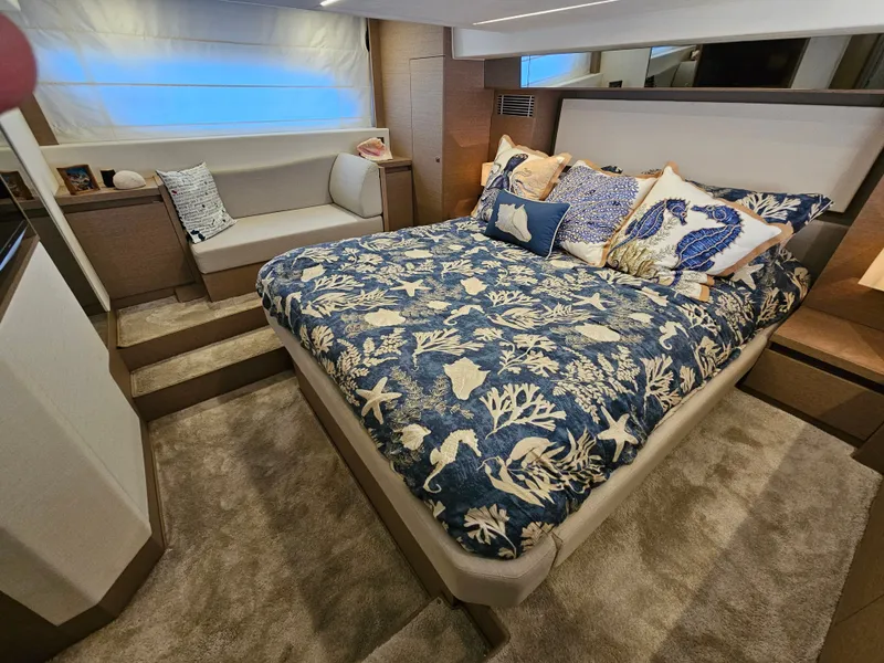 Slide: The Image of Luxurious bedroom on a 2018 Prestige 460 yacht. - 4