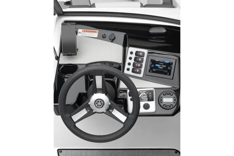 Slide: The Image of 2026 Yamaha Boats AR220 dashboard with steering wheel and control panel. - 8