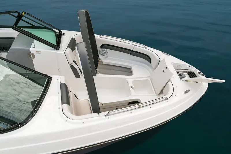 Slide: The Image of 2018 Chaparral Vortex 243 VRX boat interior on calm water. - 3
