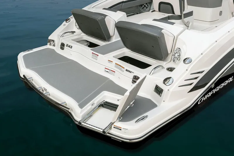 Slide: The Image of 2018 Chaparral Vortex 243 VRX boat rear view on water. - 7