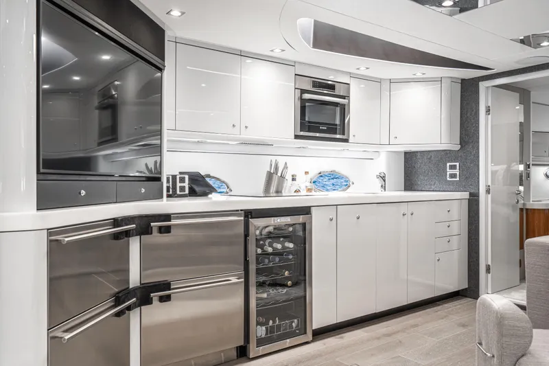 Slide: The Image of Luxurious kitchen interior of 2021 Sunseeker Predator 68 yacht with modern appliances. - 54