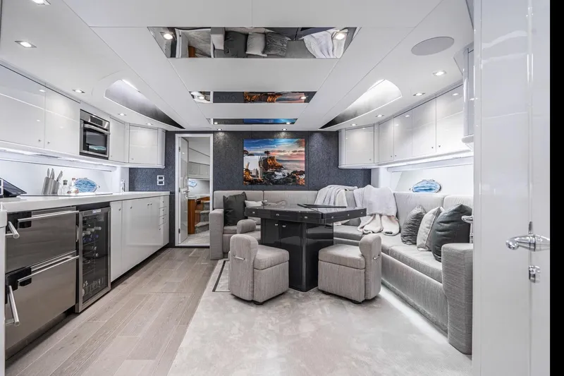 Slide: The Image of Luxurious interior of 2021 Sunseeker Predator 68 yacht with modern kitchen and seating area. - 50