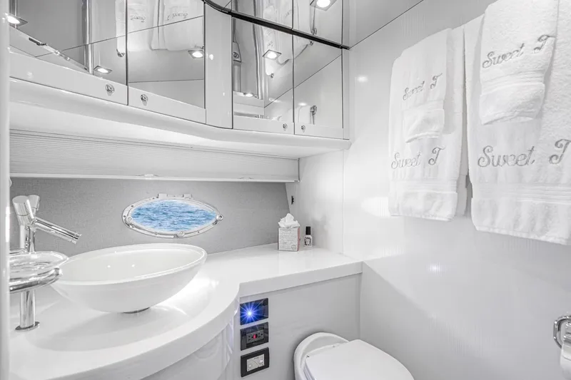 Slide: The Image of Luxurious bathroom in 2021 Sunseeker Predator 68 yacht with elegant fixtures and ocean view. - 57
