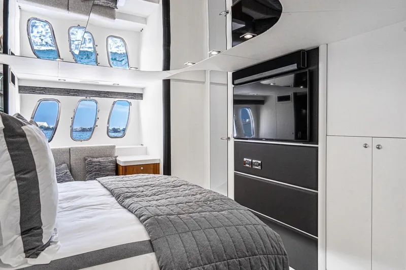 Slide: The Image of Luxurious interior of 2021 Sunseeker Predator 68 yacht bedroom with modern design. - 64