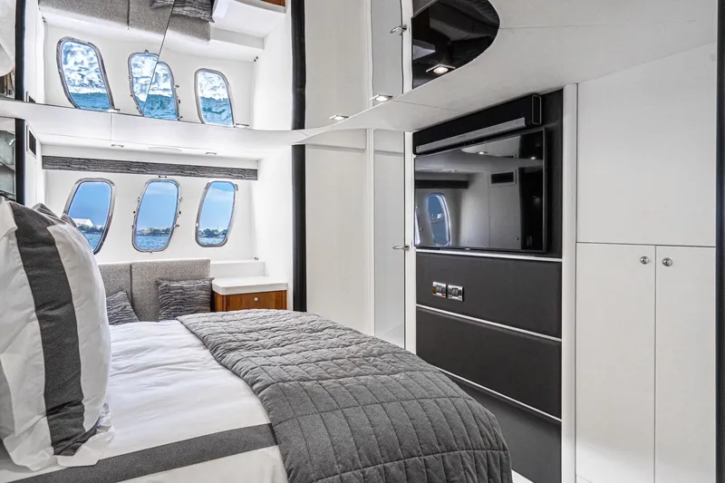 Slide: The Image of Luxurious interior of 2021 Sunseeker Predator 68 yacht with modern bedroom design. - 67