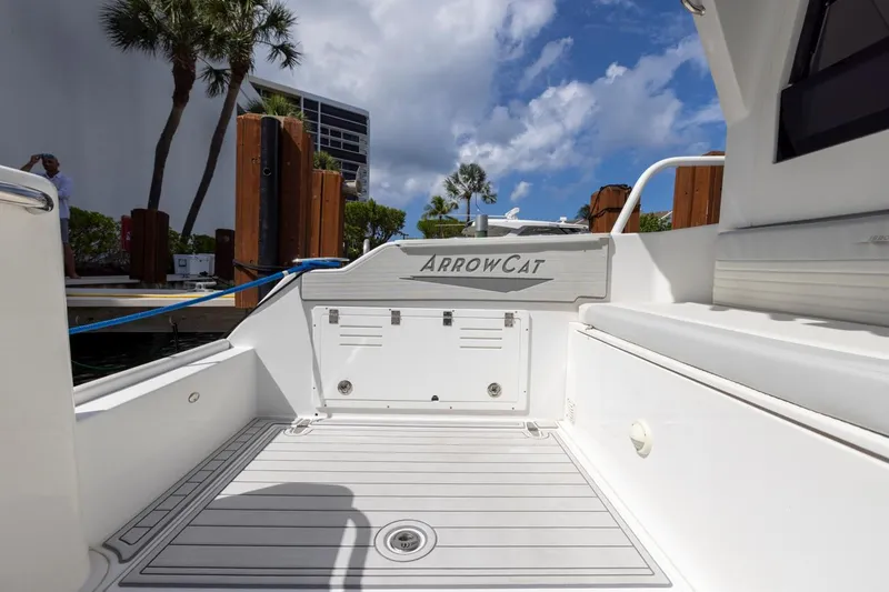 Slide: The Image of 2023 ArrowCat Flybridge Dual Helm boat deck with sleek design and modern features. - 23