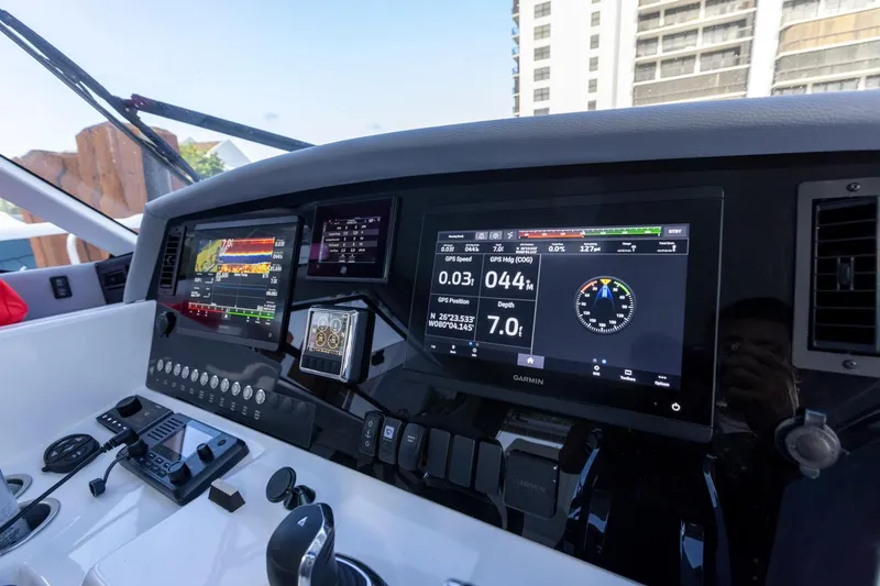 Slide: The Image of 2023 ArrowCat Flybridge Dual Helm with advanced navigation displays and controls. - 37