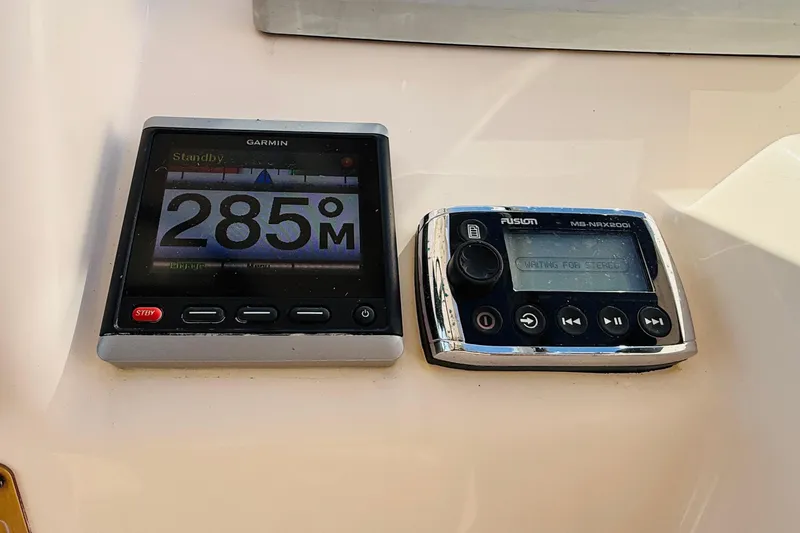 Slide: The Image of Garmin navigation display on 2014 Grady-White Freedom 275 boat dashboard. - 15