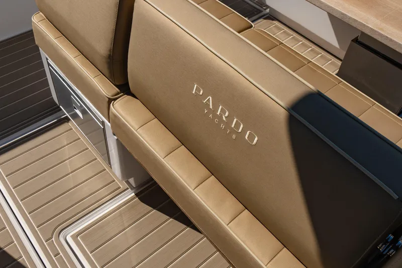 Slide: The Image of Top view of 2025 Pardo Yachts P38R luxury boat on green water. - 11