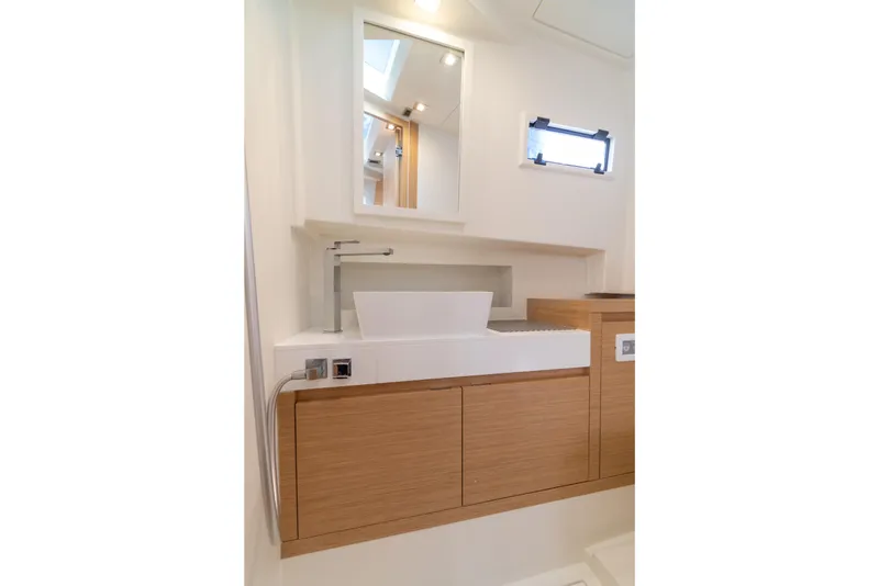 Slide: The Image of Luxurious interior of 2025 Pardo Yachts P38R, featuring modern wood finishes and skylight. - 26