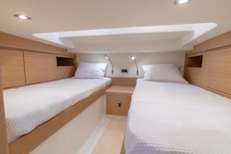 Slide: The Image of Luxurious cabin interior of 2025 Pardo Yachts P38R with modern design and cozy bedding. - 28