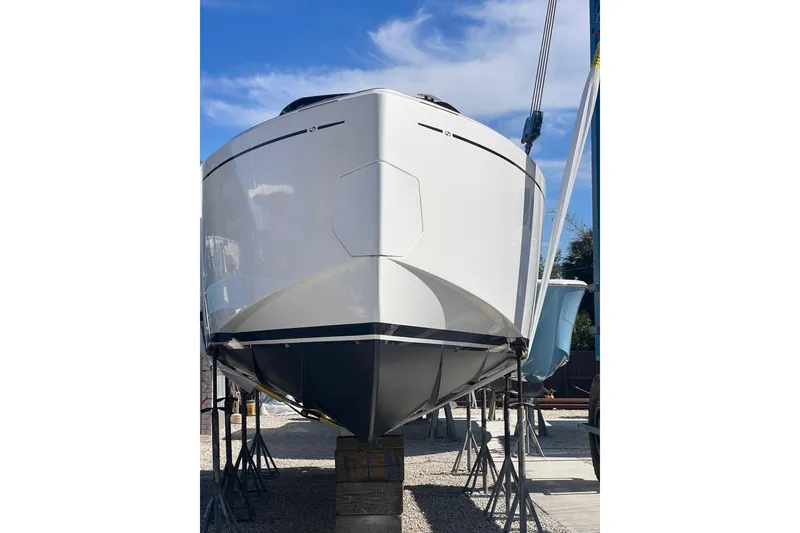 Slide: The Image of 2025 Pardo Yachts P38R on dry dock, showcasing sleek hull design. - 37