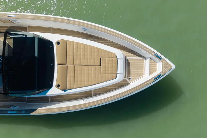 Slide: The Image of 2025 Pardo Yachts P38R cruising in a scenic waterfront setting. - 4