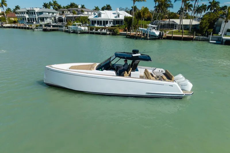 The Image of 2025 Pardo Yachts P38 cruising on turquoise waters under clear blue skies. - 0