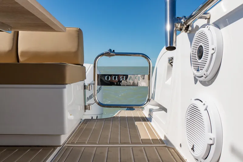 Slide: The Image of 2025 Pardo Yachts P38R interior with beige seating and ocean view. - 10