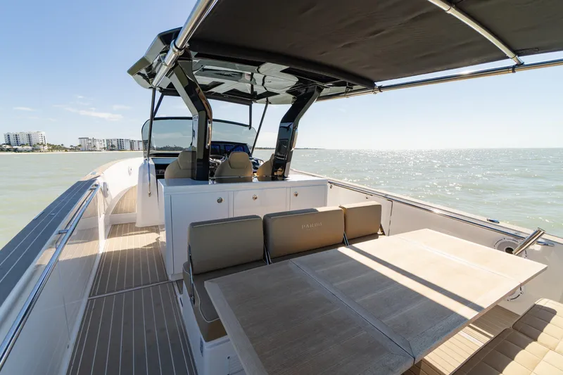 Slide: The Image of 2025 Pardo Yachts P38R luxury yacht interior with seating and ocean view. - 12