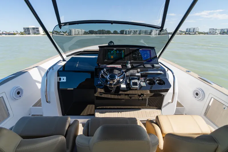 Slide: The Image of 2025 Pardo Yachts P38R cockpit with modern navigation system and luxurious seating. - 18