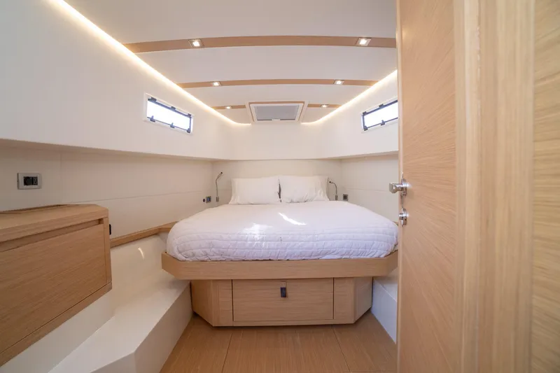 Slide: The Image of Luxurious cabin interior of 2025 Pardo Yachts P38R with modern design and cozy bedding. - 23