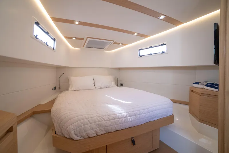 Slide: The Image of Luxurious cabin interior of 2025 Pardo Yachts P38R with modern design and cozy bedding. - 24