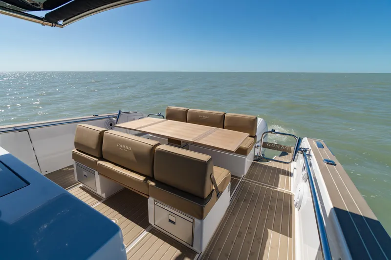 Slide: The Image of 2025 Pardo Yachts P38R luxury yacht deck with seating, ocean view. - 9