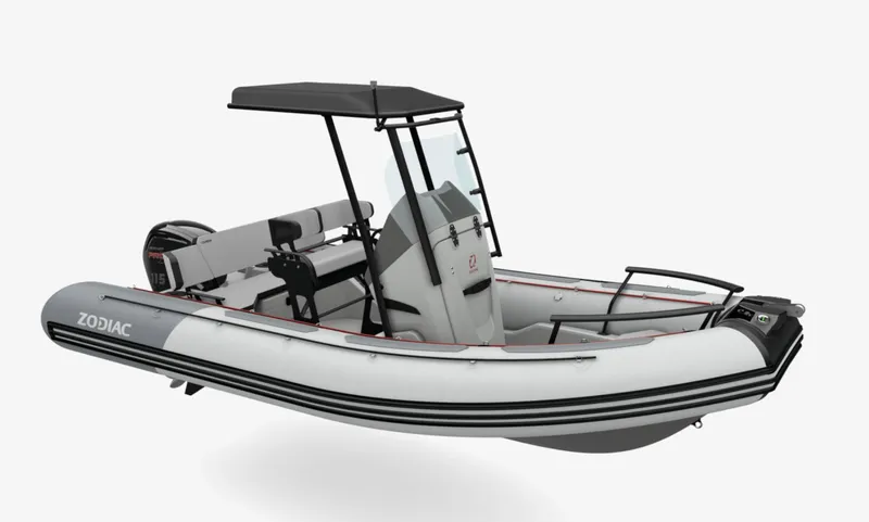 Slide: The Image of 2024 Zodiac Open 5.5 inflatable boat with T-top and center console. - 3