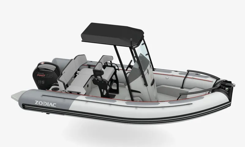 Slide: The Image of 2024 Zodiac Open 5.5 inflatable boat with canopy and outboard motor. - 5