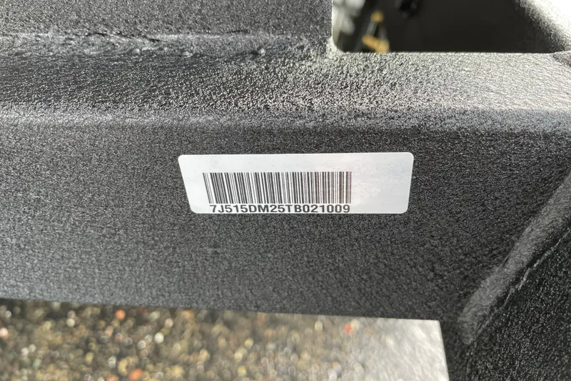 Slide: The Image of Barcode on a textured surface of a 2026 Tahoe T21 vehicle component. - 122