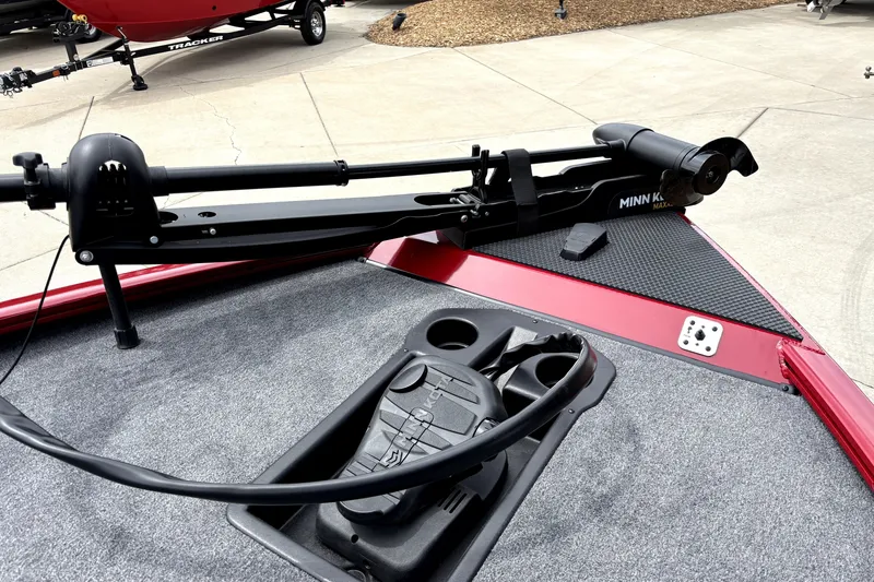 Slide: The Image of 2026 Tracker Savage 215 boat with Minn Kota trolling motor on deck. - 17