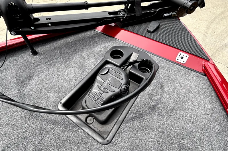 Slide: The Image of 2026 Tracker Savage 215 boat deck with Minn Kota trolling motor and foot pedal. - 18