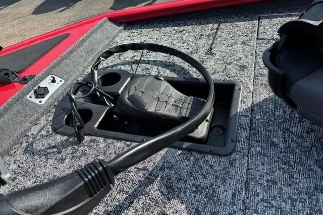Slide: The Image of 2026 Tracker Pro Team 195 boat deck with steering wheel and controls. - 10