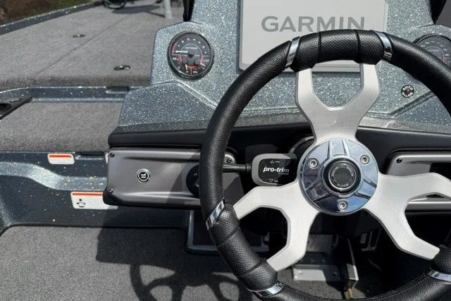 Slide: The Image of Steering wheel and dashboard of 2026 Nitro Z20 XL Pro boat with Garmin display. - 15