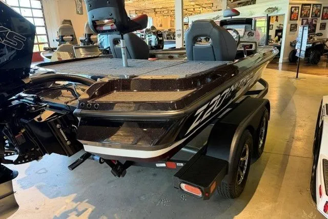 Slide: The Image of 2026 Nitro Z20 XL Pro boat in showroom, featuring sleek design and dual seating. - 1
