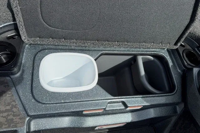 Slide: The Image of 2026 Nitro Z20 XL Pro boat storage compartments with cup holders and organized interior design. - 13