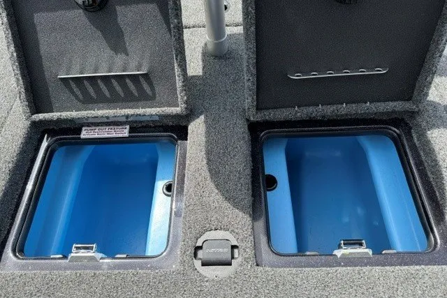 Slide: The Image of 2026 Nitro Z20 XL Pro boat storage compartments with open lids, showcasing interior design. - 18