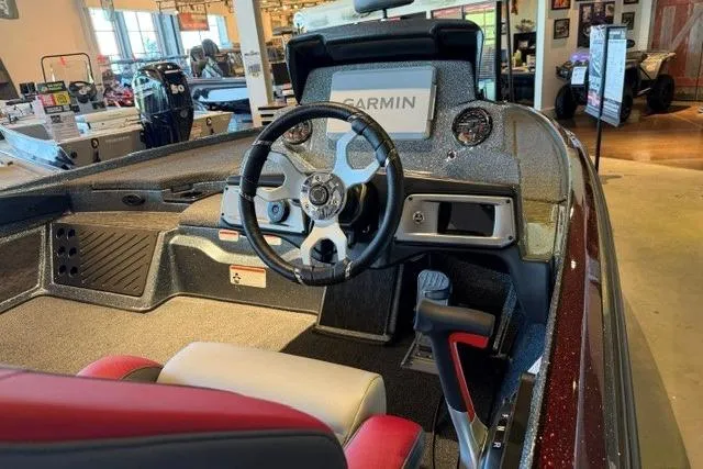 Slide: The Image of 2026 Nitro Z20 XL Pro boat interior with Garmin navigation system and modern steering wheel. - 4