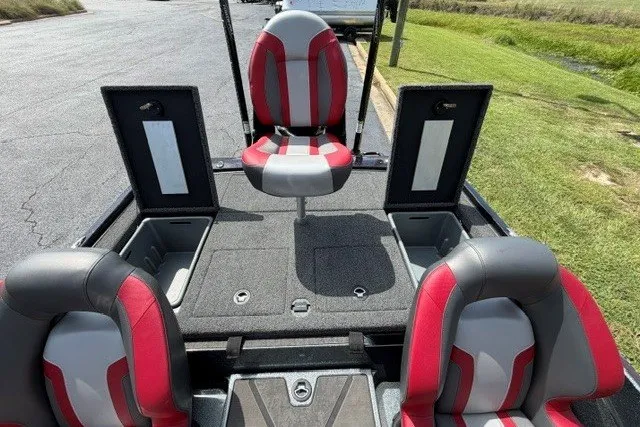 Slide: The Image of 2026 Nitro Z20 XL Pro boat interior with red and gray seating and storage compartments. - 20