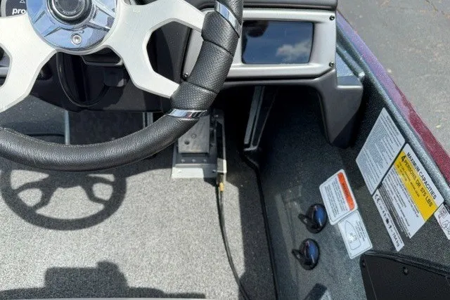 Slide: The Image of Steering wheel and dashboard of 2026 Nitro Z20 XL Pro boat interior. - 17