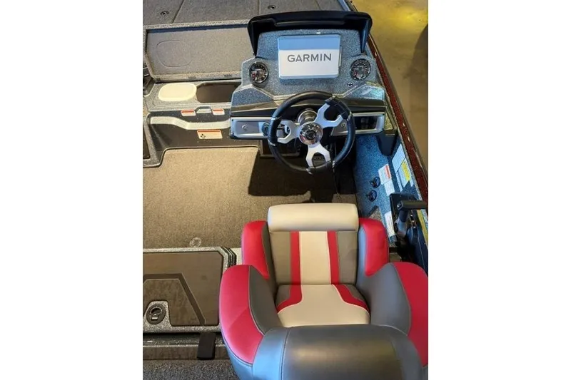 Slide: The Image of 2026 Nitro Z20 XL Pro boat interior with Garmin dashboard and red-gray seating. - 10