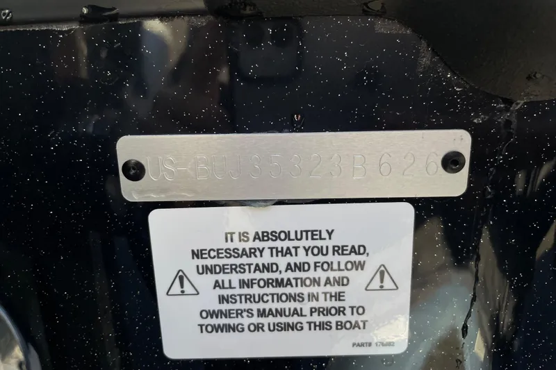 Slide: The Image of Hull identification number on a 2026 Nitro Z18 boat with safety instructions. - 125