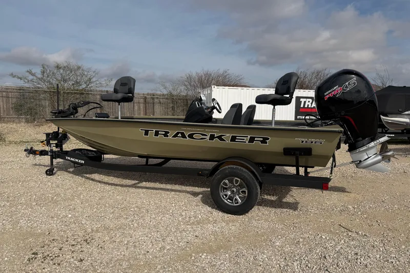 The Image of 2026 Tracker Pro Team 195 boat on trailer, parked outdoors. - 0