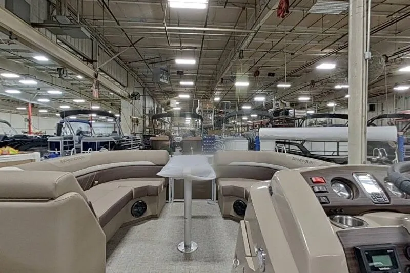 Slide: The Image of Interior view of 2026 Bennington 22SXSR boat in a manufacturing facility. - 11