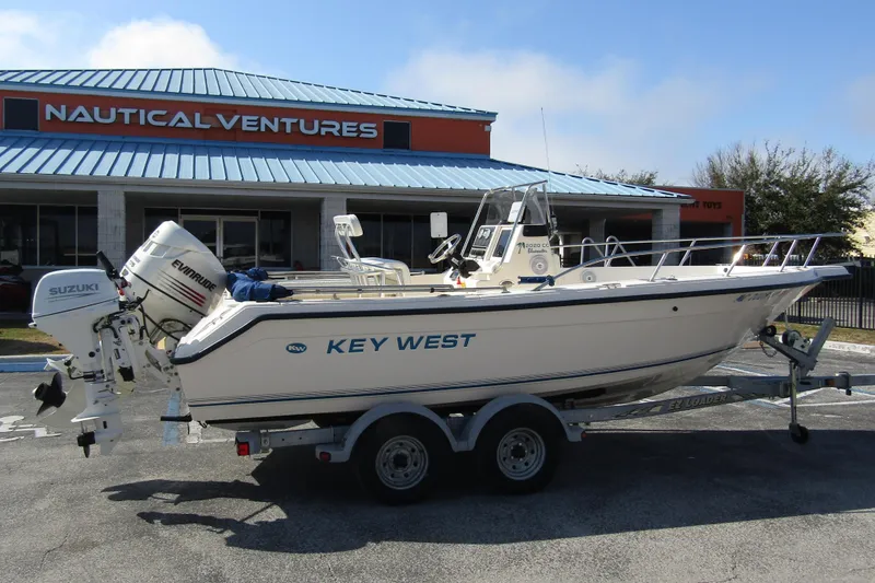 Slide: The Image of Key West 2020 Center Console boat, 2004 model, on trailer outside Nautical Ventures. - 3