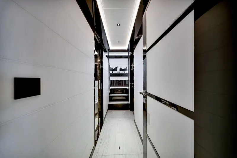Slide: The Image of Luxurious interior hallway of 2021 Sirena 88 yacht, featuring modern design and sleek finishes. - 100