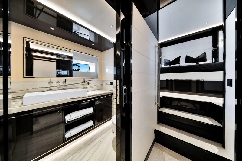 Slide: The Image of Luxurious interior of 2021 Sirena 88 yacht featuring modern bathroom and sleek design elements. - 101
